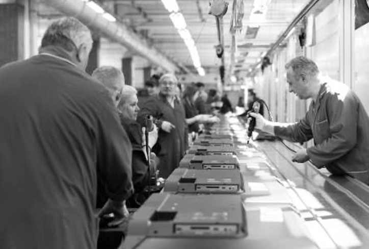 Photo of workers on an assembly line