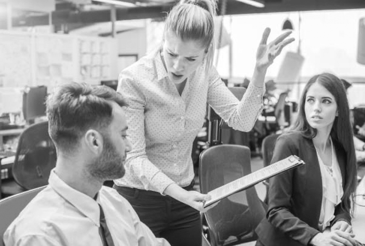 Photo of a manager bullying a worker