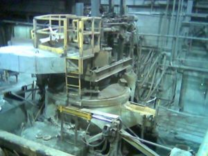 Background image showing the Melt Department at Neelon Casting
