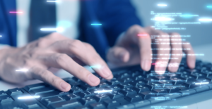 Closeup photo of a person working on a keyboard