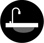 Icon of a counter top with a faucet and sink below representing artificial counter tops